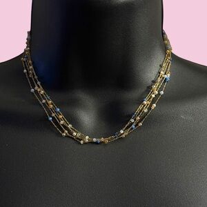 Frenzy delicate layered multi strand station bead necklace